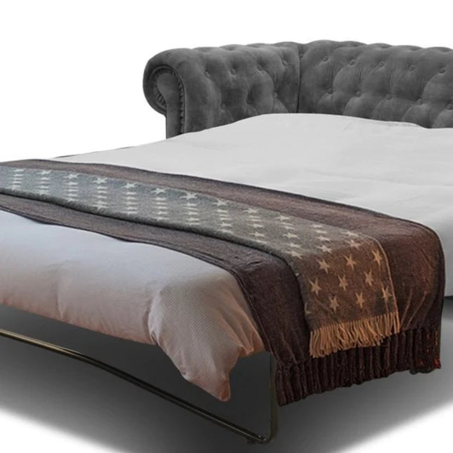 The Grande fold out metal action chesterfield sofa bed